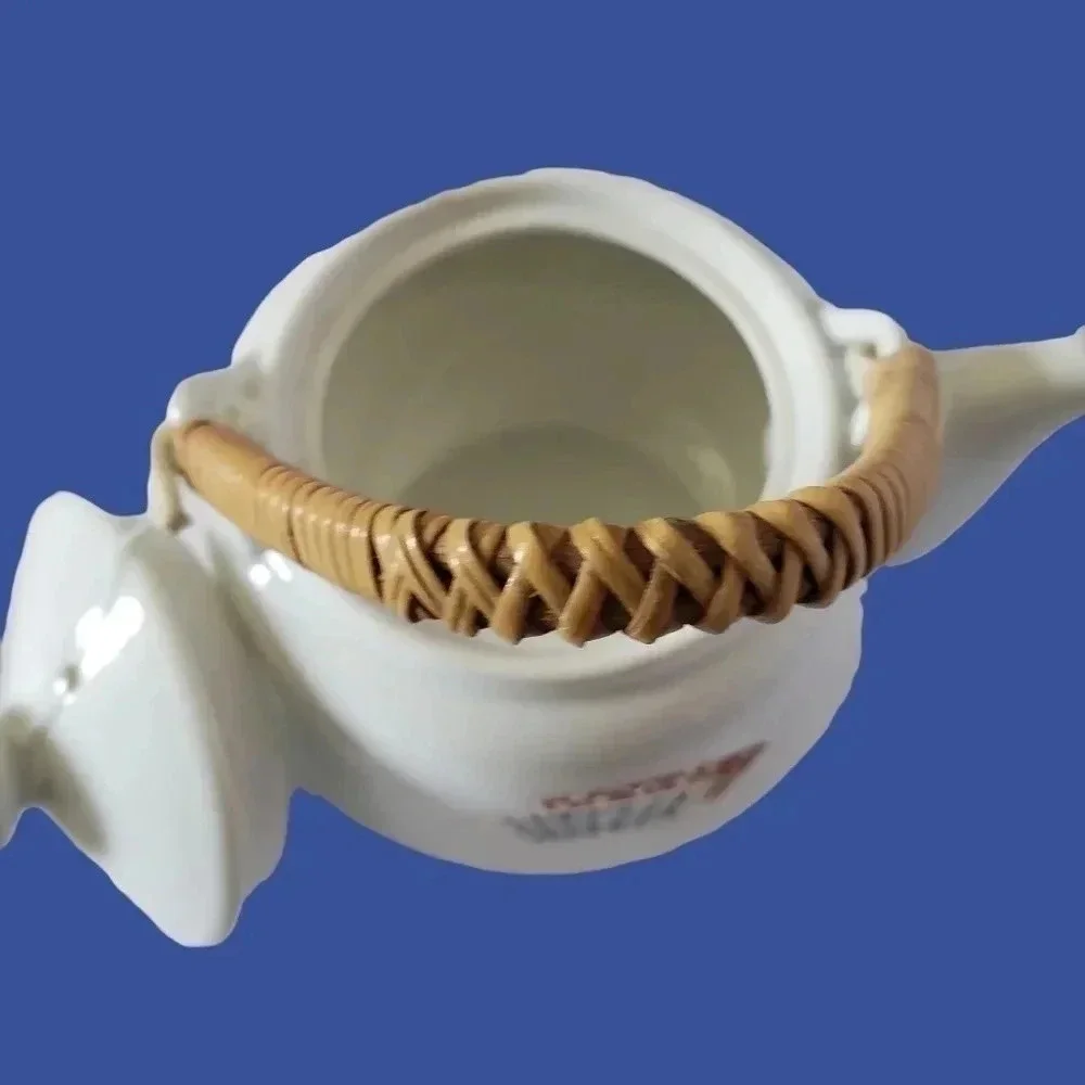 Porcelain set of 5 teapot and cups